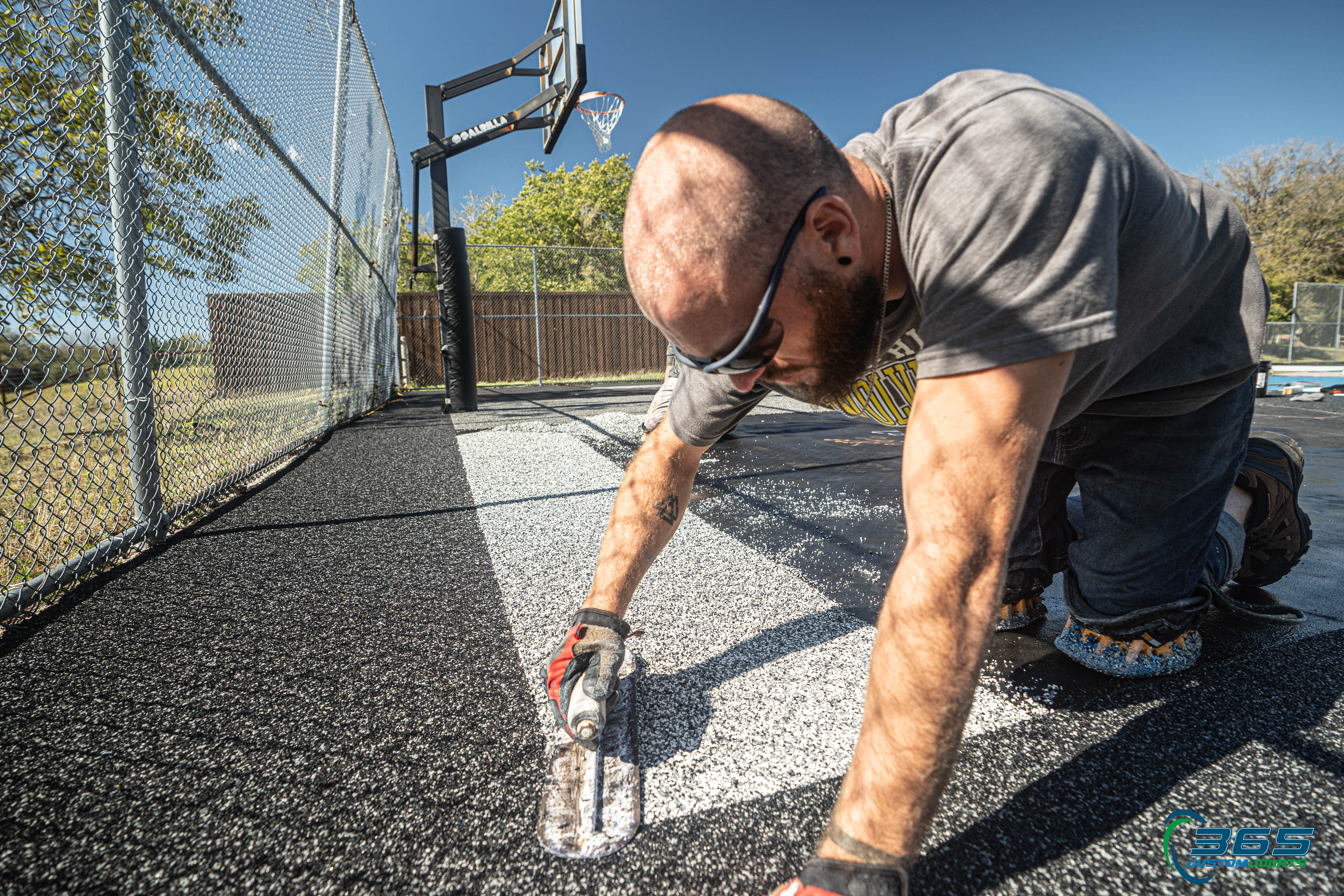 Second view of a custom blue pickleball court in Willow Park