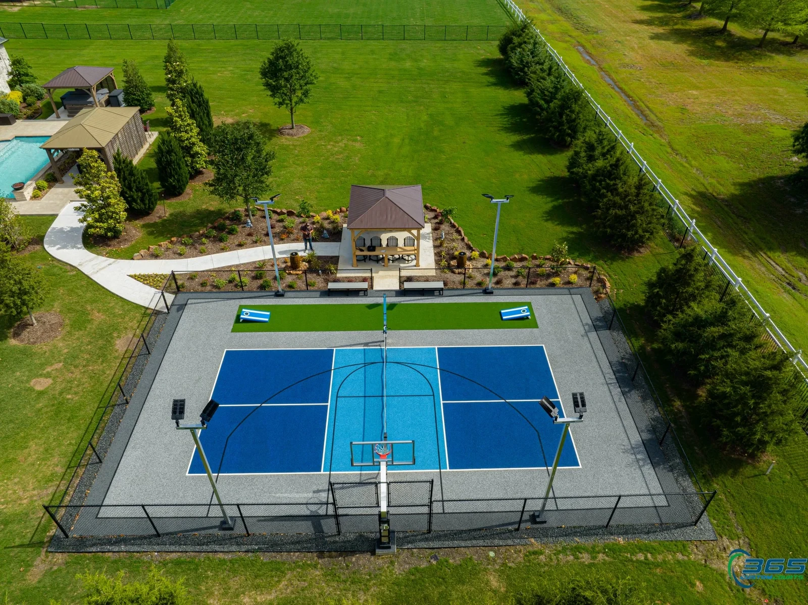 Aerial view of a custom blue and gray multi-sport court